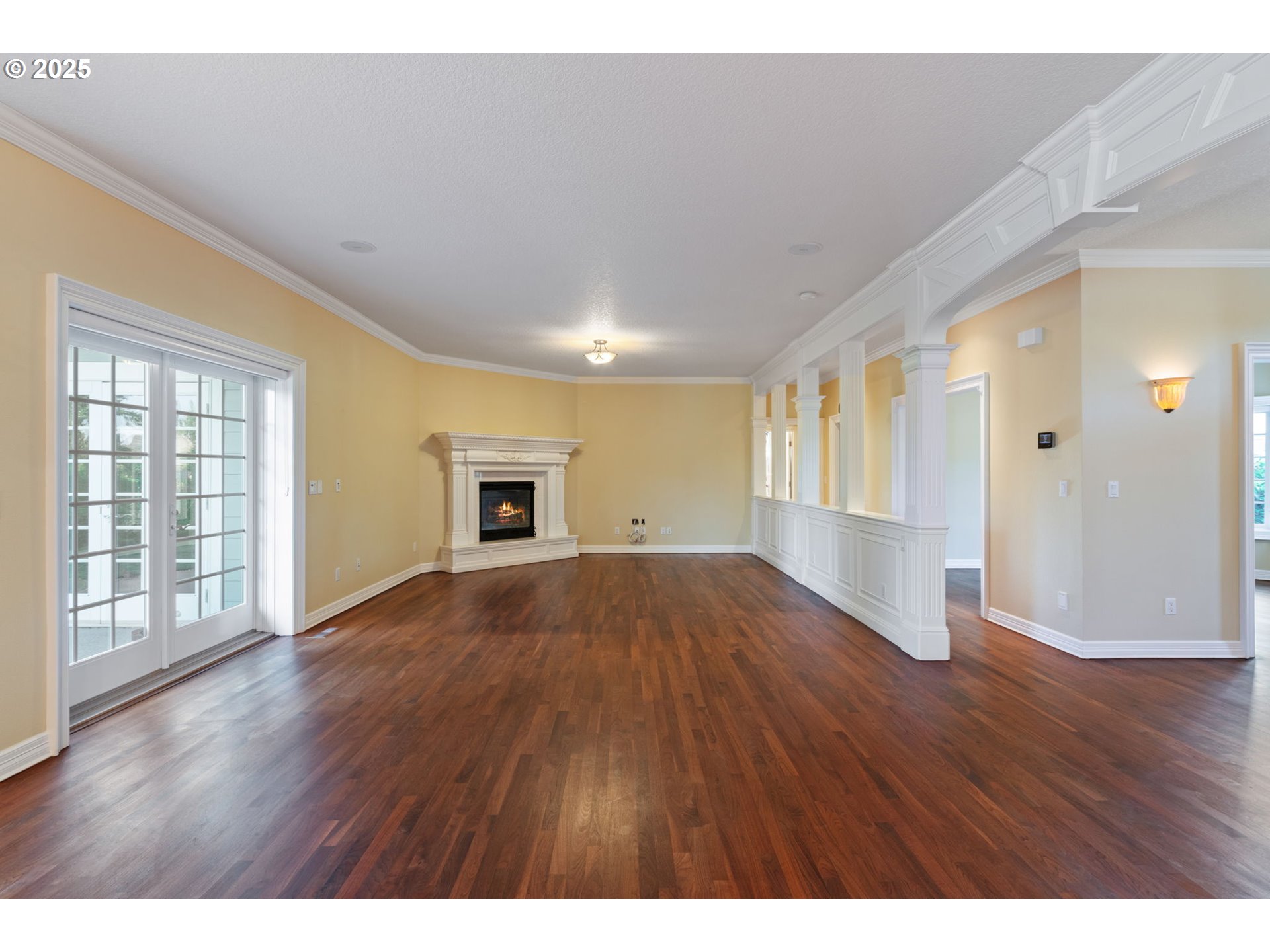 3110 Northwest Lacamas Drive Camas, WA 98607 - Photo 9 of 48 a view of an empty room with wooden floor and a window