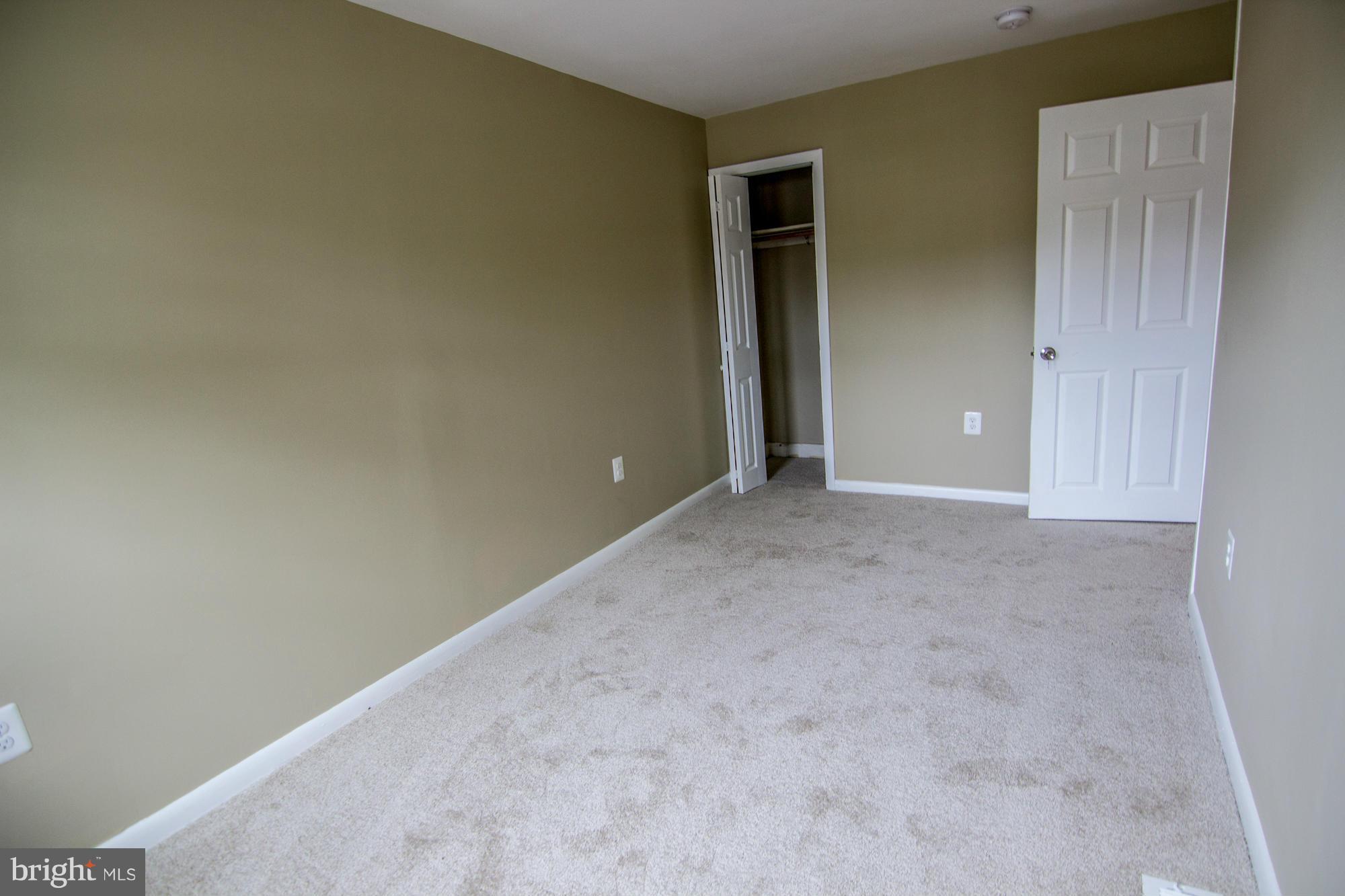 222 Old Riverside Road Baltimore, MD 21225 - Photo 14 of 24 a view of an empty room and closet area