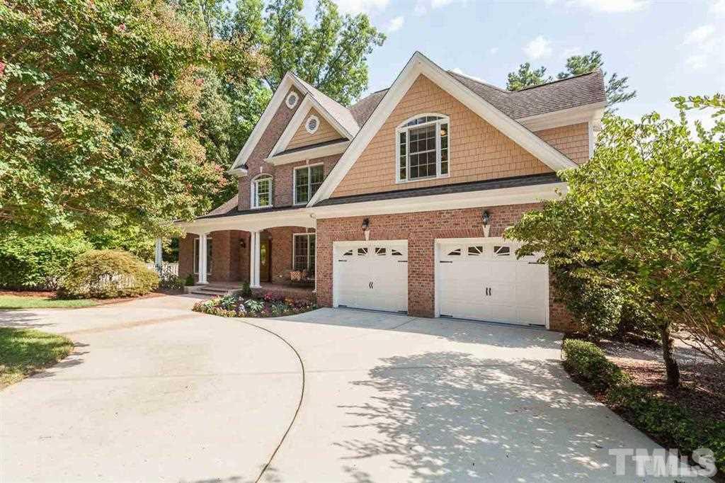 10500 Charmford Way Raleigh, NC 27615 - Photo 2 of 22 a view of a house with a yard