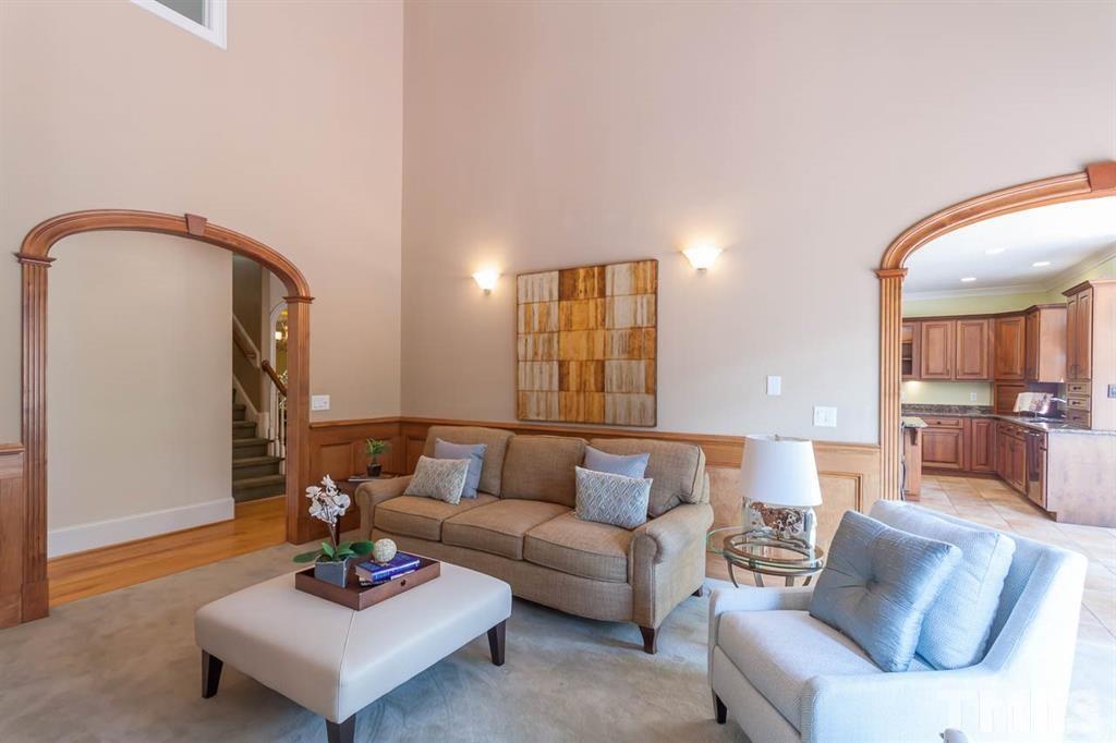 10500 Charmford Way Raleigh, NC 27615 - Photo 11 of 22 a living room with furniture and a wooden floor