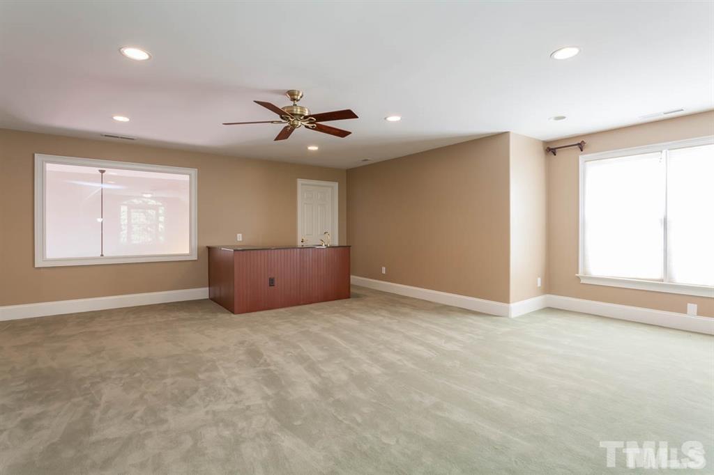 10500 Charmford Way Raleigh, NC 27615 - Photo 18 of 22 a view of an empty room with a window