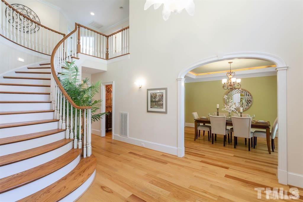 10500 Charmford Way Raleigh, NC 27615 - Photo 4 of 22 a view of a livingroom with furniture and hardwood floor