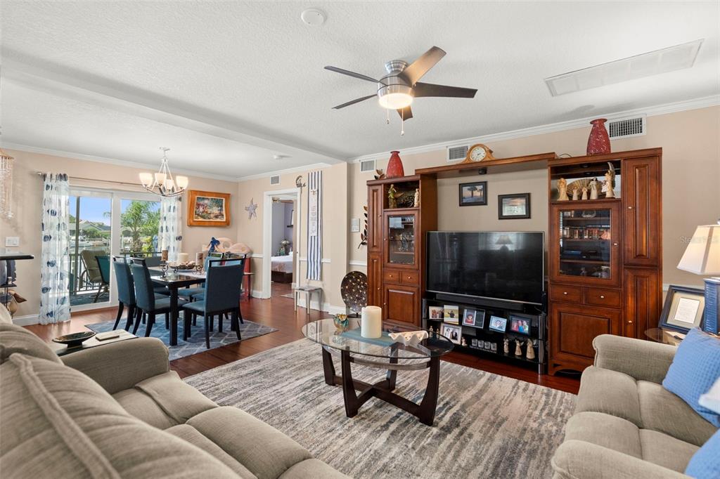 6170 Seaside Drive New Port Richey, FL 34652 - Photo 39 of 89 a living room with furniture and a flat screen tv