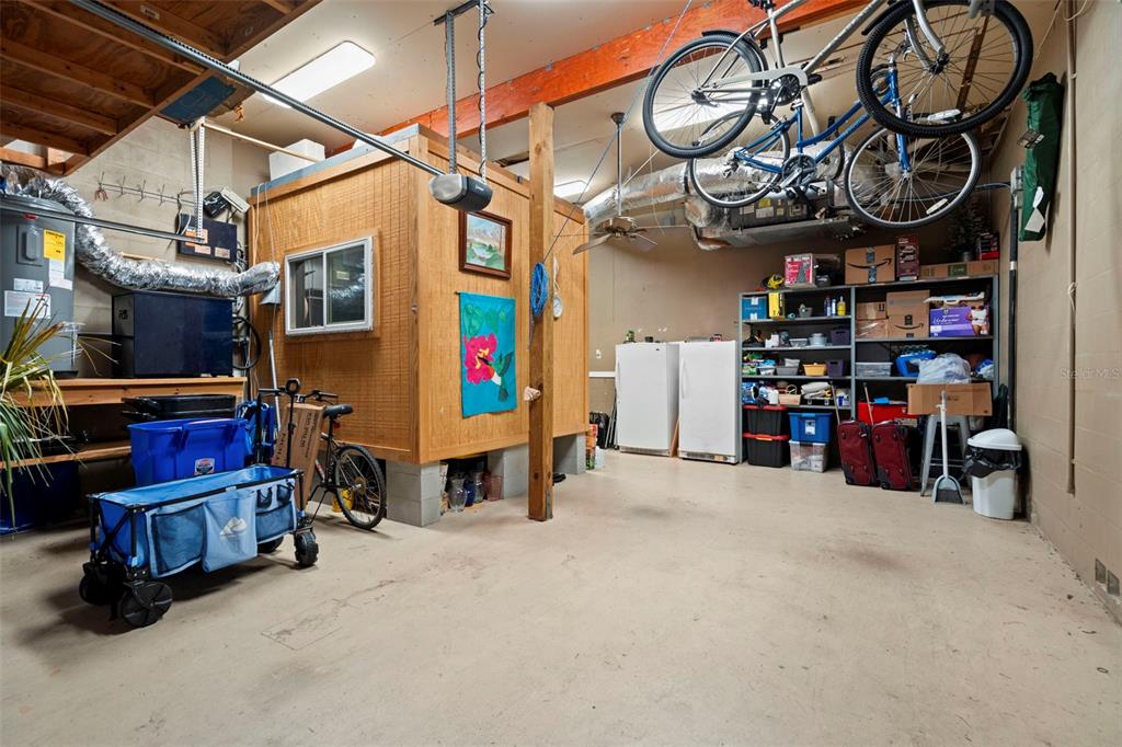 6170 Seaside Drive New Port Richey, FL 34652 - Photo 52 of 89 a view of a storage room with a lot of stuff
