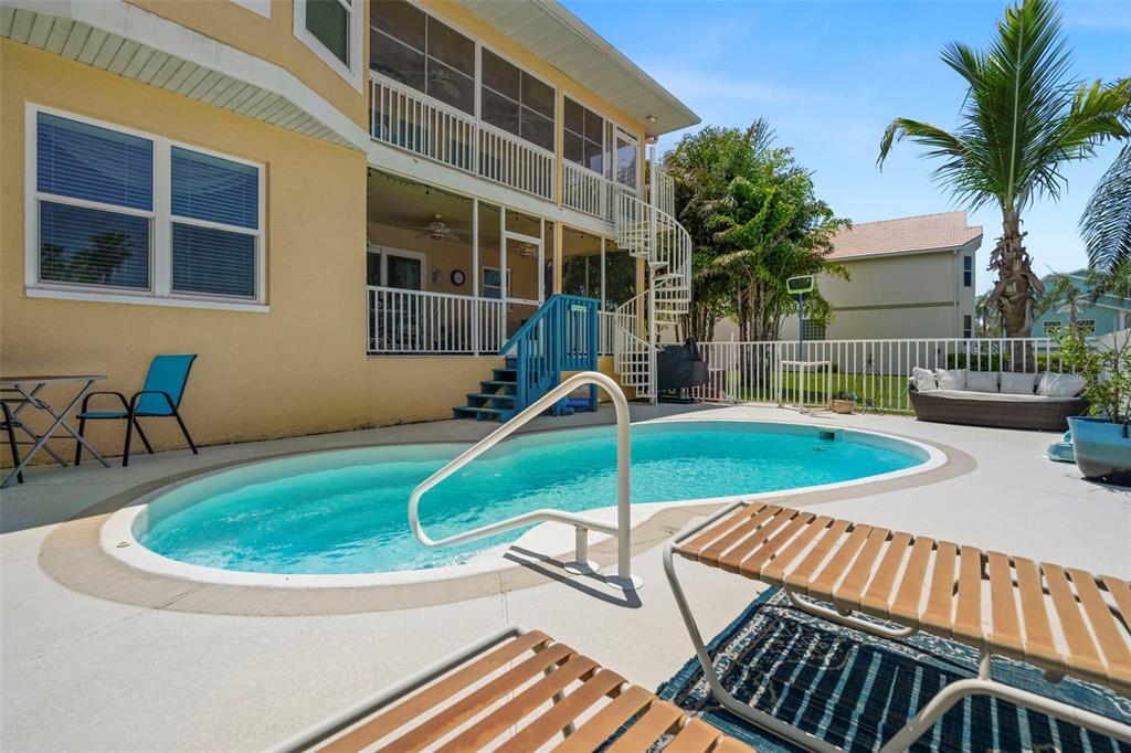 6170 Seaside Drive New Port Richey, FL 34652 - Photo 55 of 89 a view of a house with a swimming pool
