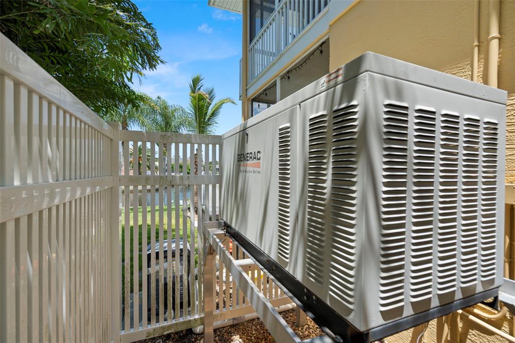 6170 Seaside Drive New Port Richey, FL 34652 - Photo 62 of 89 a front view of a building with glass windows