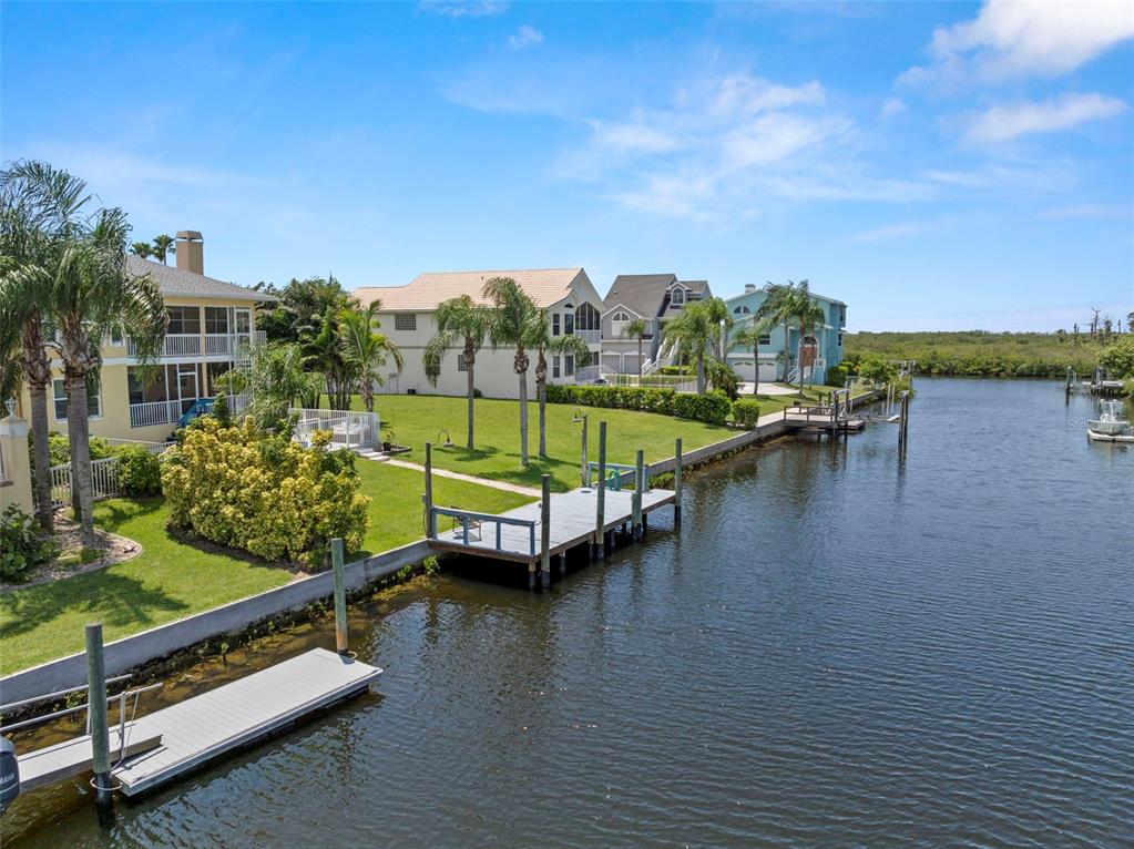 6170 Seaside Drive New Port Richey, FL 34652 - Photo 69 of 89 a view of swimming pool with seating area and mountain view