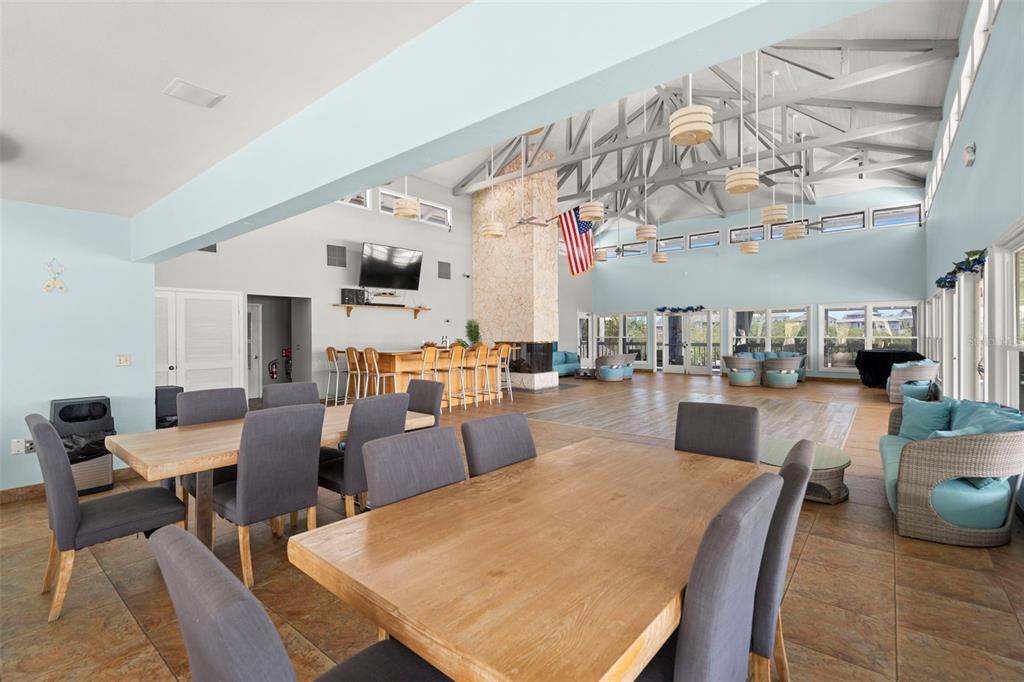 6170 Seaside Drive New Port Richey, FL 34652 - Photo 80 of 89 a view of a dining room with furniture