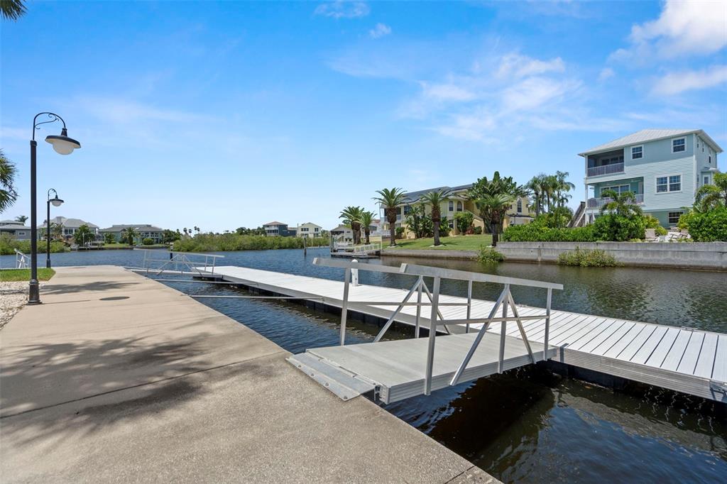 6170 Seaside Drive New Port Richey, FL 34652 - Photo 85 of 89 a view of balcony with outdoor space and lake view