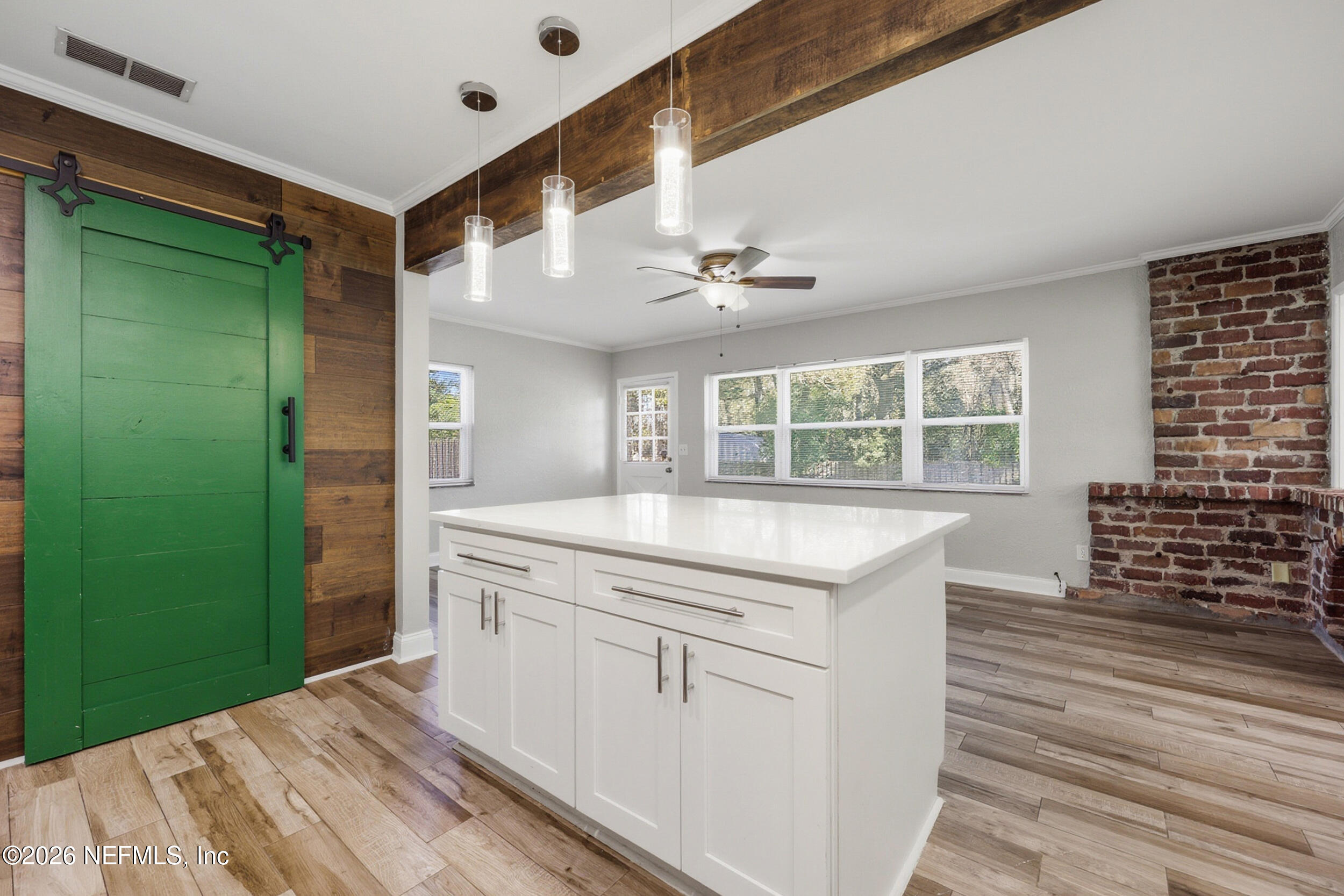 1873 Stanford Road North Jacksonville, FL 32207 - Photo 15 of 37 a kitchen with kitchen island a sink stove and refrigerator