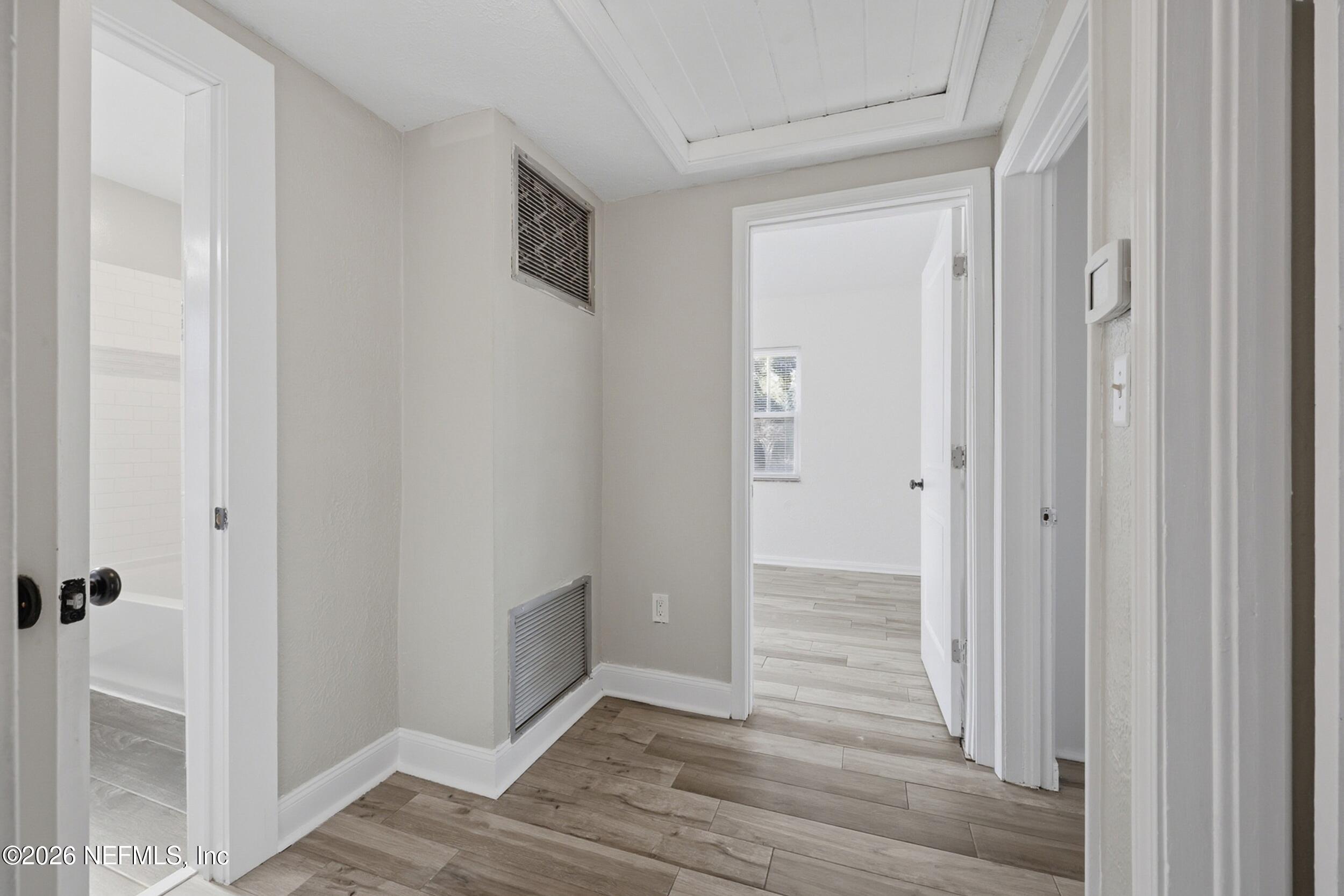 1873 Stanford Road North Jacksonville, FL 32207 - Photo 18 of 37 a view of a hallway with wooden floor