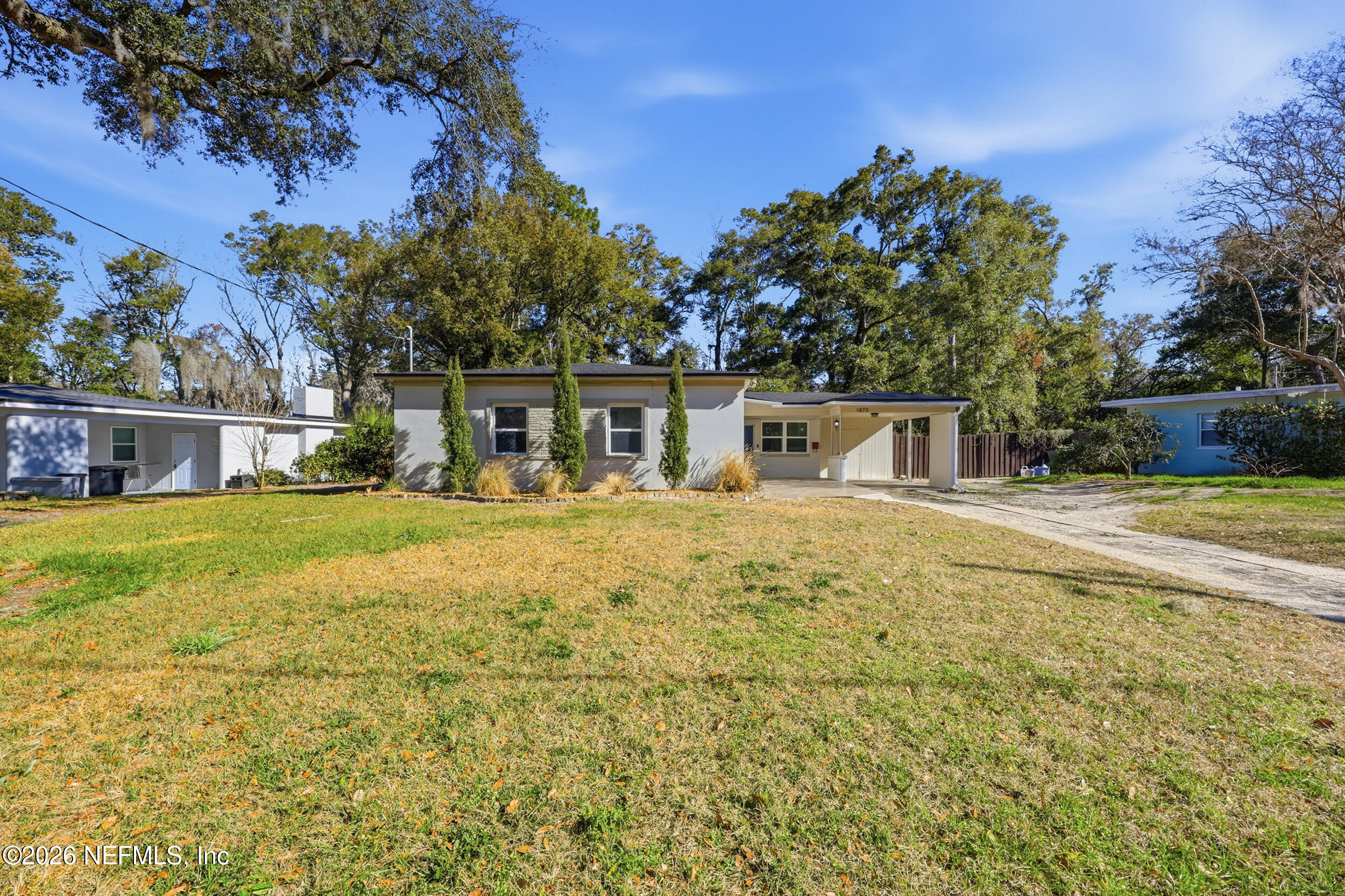 1873 Stanford Road North Jacksonville, FL 32207 - Photo 2 of 37 a front view of house with yard and green space