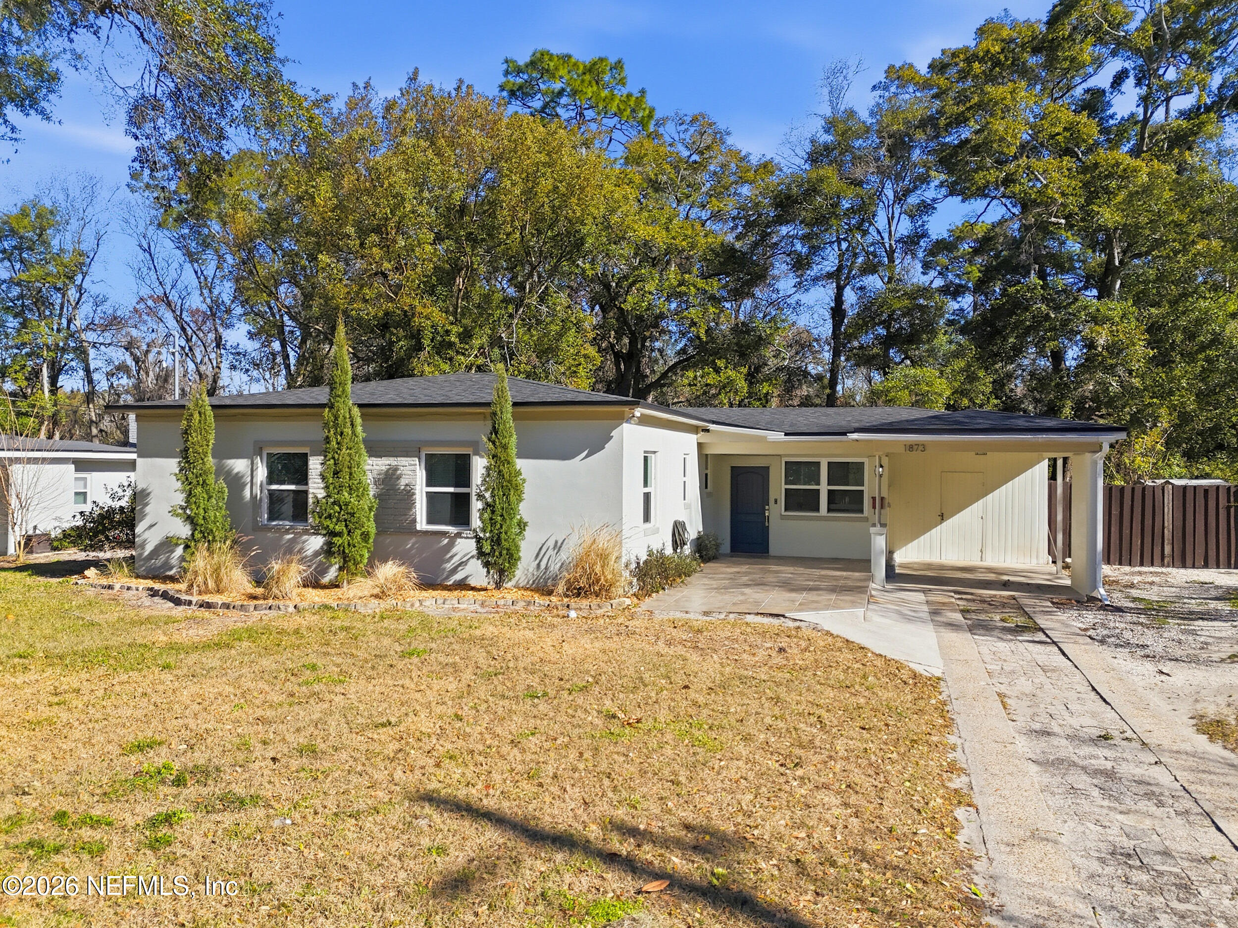 1873 Stanford Road North Jacksonville, FL 32207 - Photo 3 of 37 a front view of a house with a patio