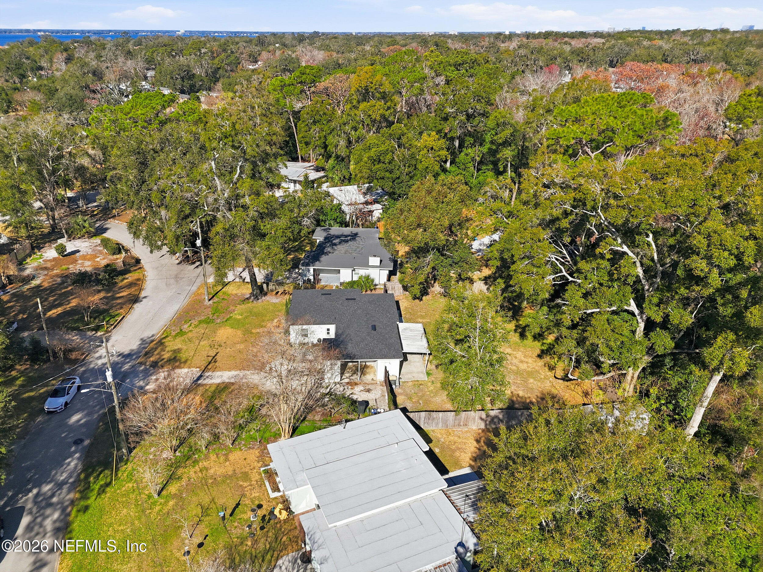 1873 Stanford Road North Jacksonville, FL 32207 - Photo 33 of 37 an aerial view of residential houses with outdoor space and trees