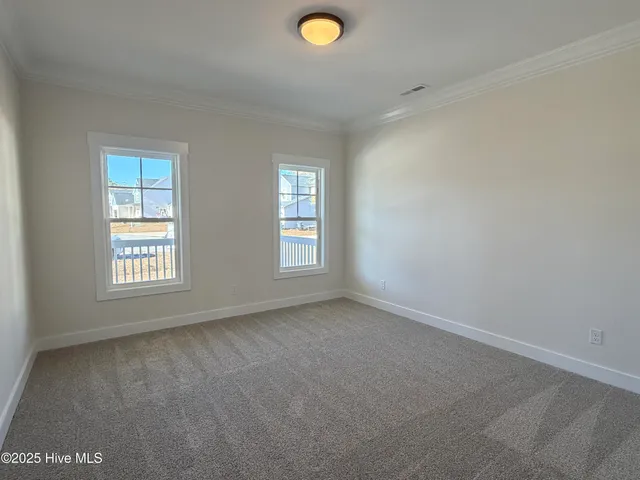 $634,900 | 302 East Ivybridge Drive, Hubert, NC 28539