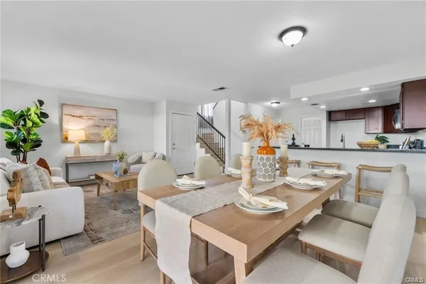 a living room with furniture and a table