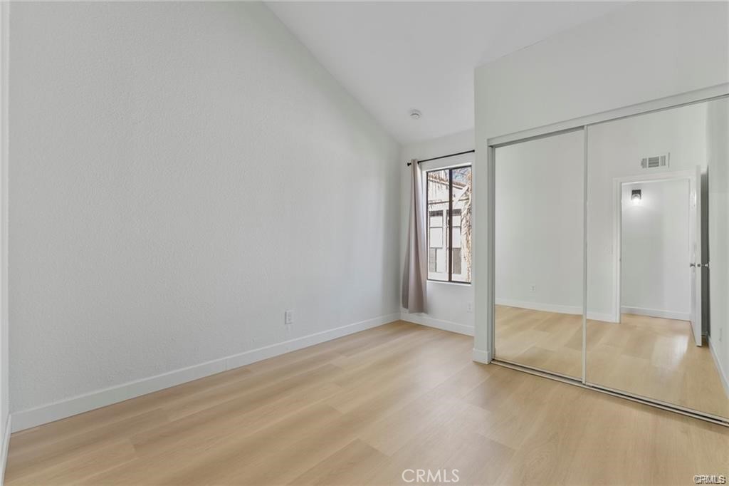 4814 Ranch Road Chino, CA 91710 - Photo 19 of 27 an empty room with windows and closet