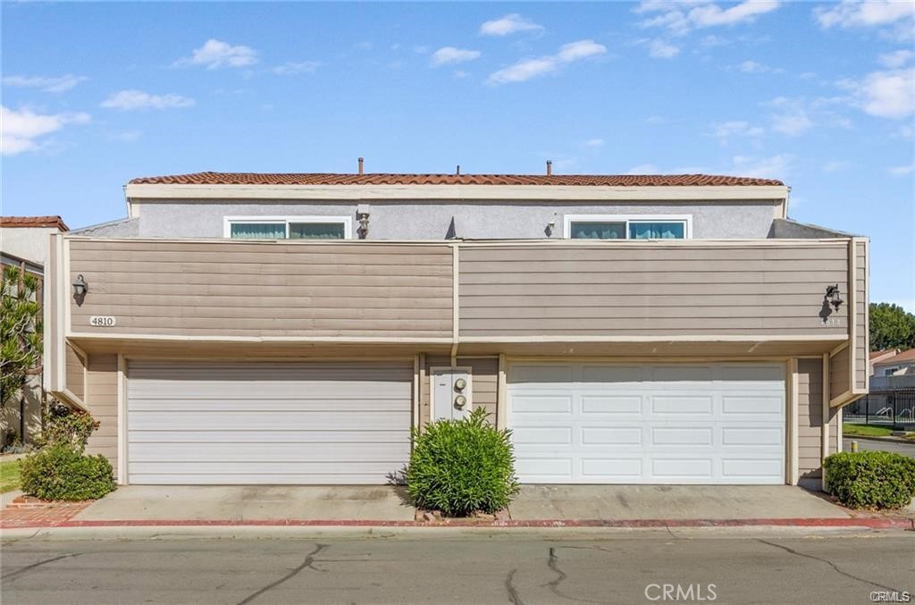 4814 Ranch Road Chino, CA 91710 - Photo 22 of 27 a front view of a house with garage and plants