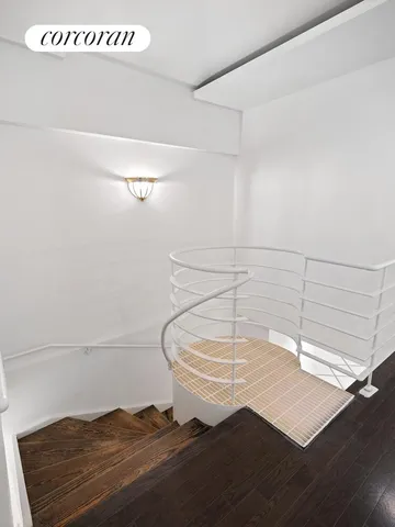 a view of balcony with furniture