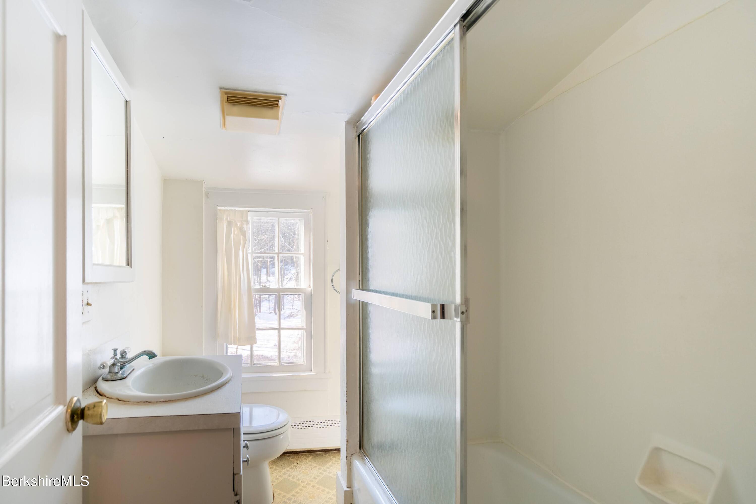 151 Hillsdale Road Egremont, MA 01230 - Photo 17 of 23 a bathroom with a sink toilet and shower