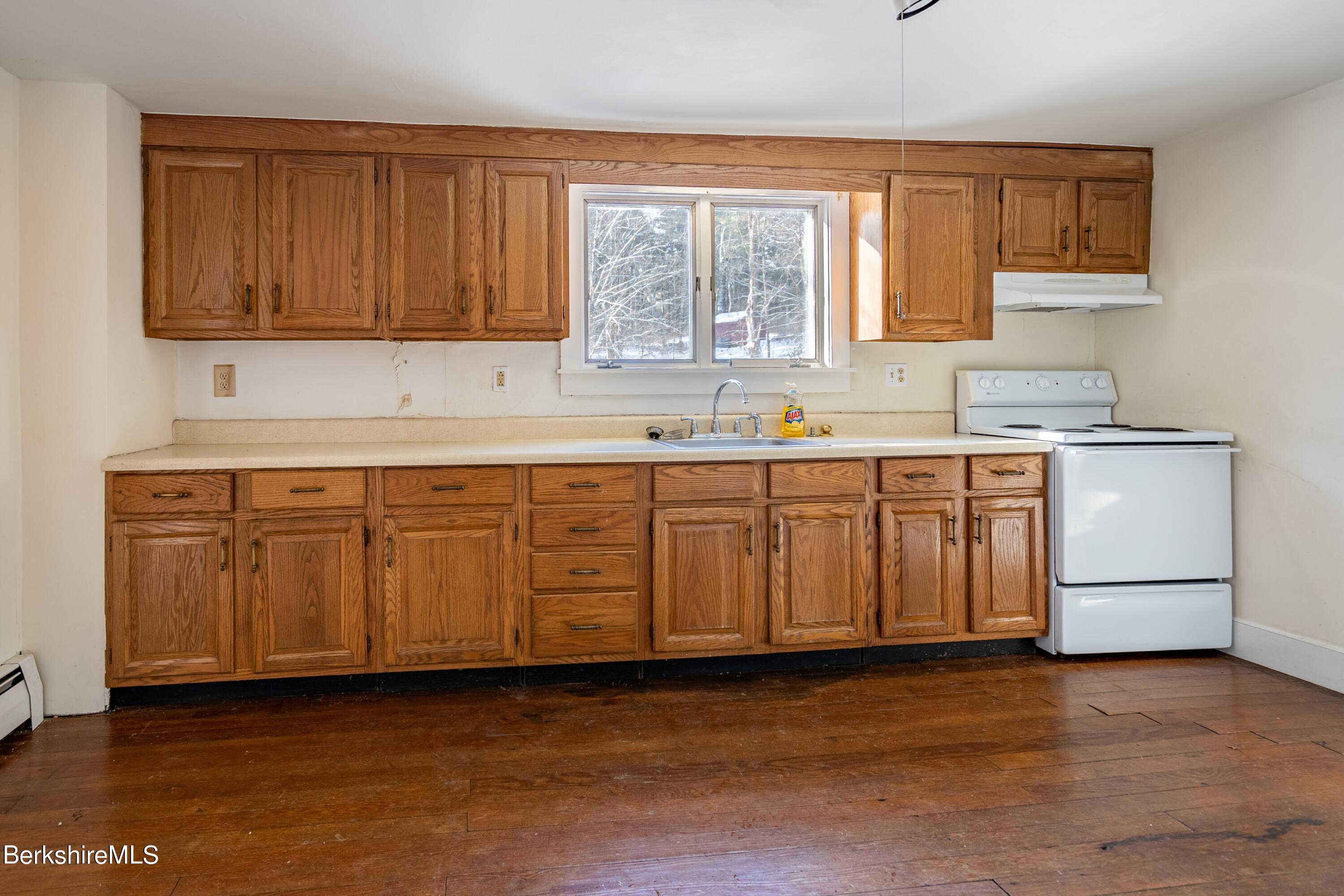151 Hillsdale Road Egremont, MA 01230 - Photo 9 of 23 a kitchen with a sink cabinets and window