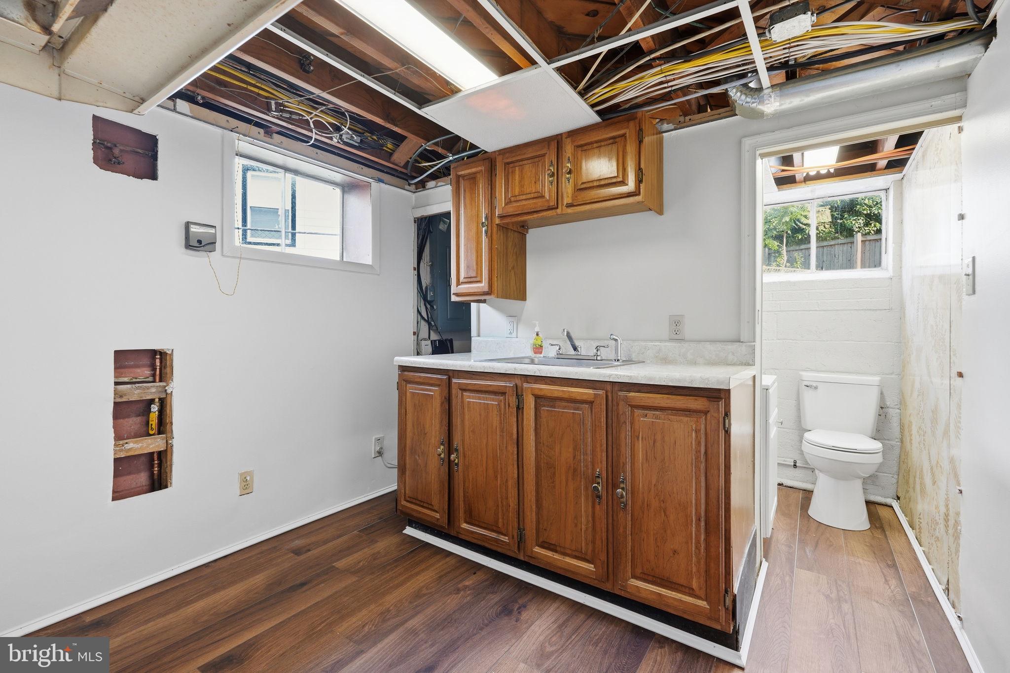 8418 Geneva Road Pasadena, MD 21122 - Photo 25 of 39 Utility Room Lower Level and Half Bath