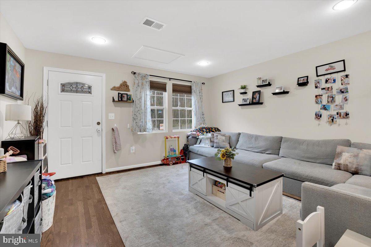 6519 Woodland Road Suitland, MD 20746 - Photo 13 of 35 a living room with furniture and window