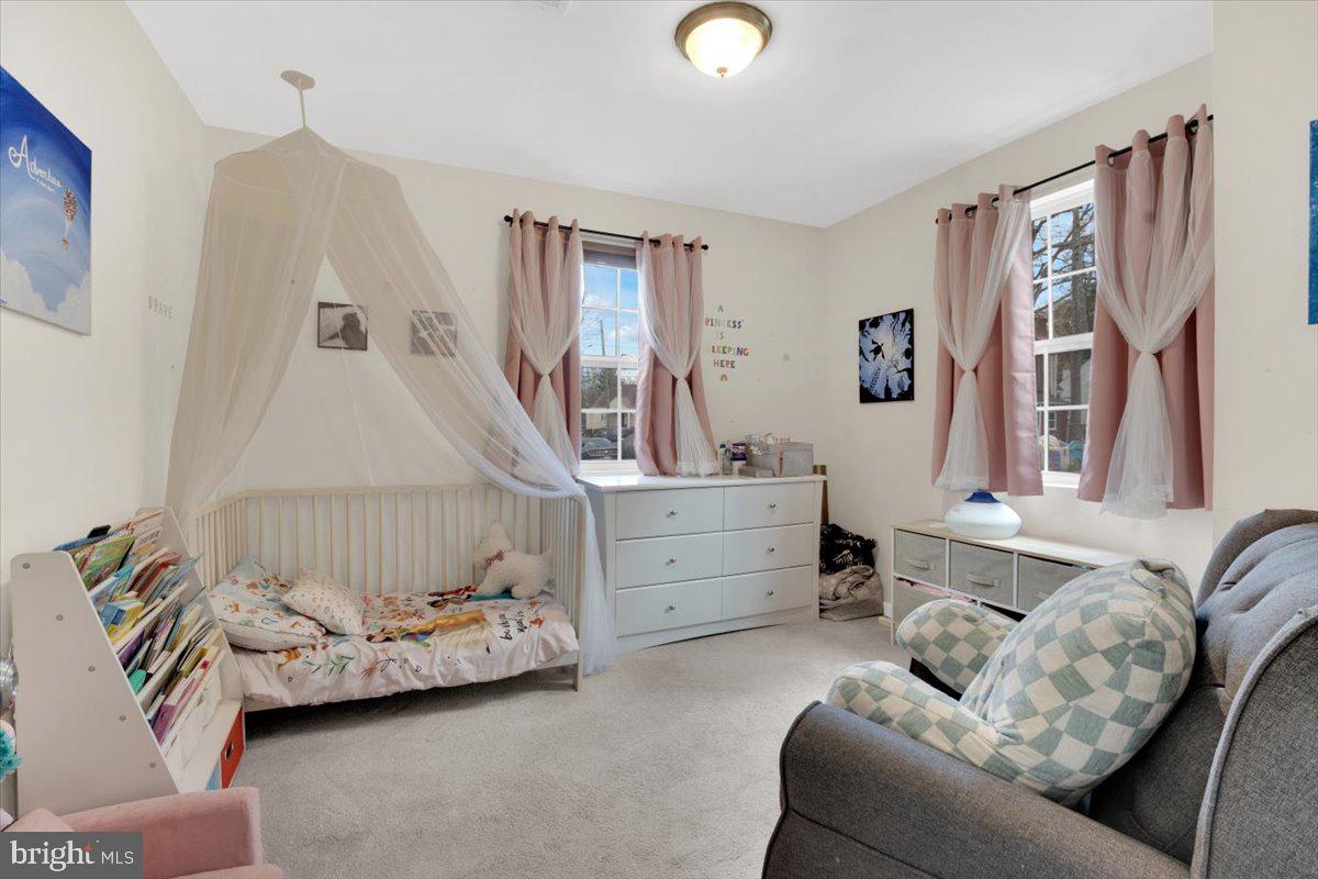 6519 Woodland Road Suitland, MD 20746 - Photo 15 of 35 a bedroom with furniture and a window