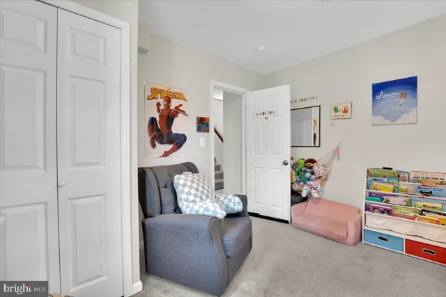 a living room with furniture and a couch