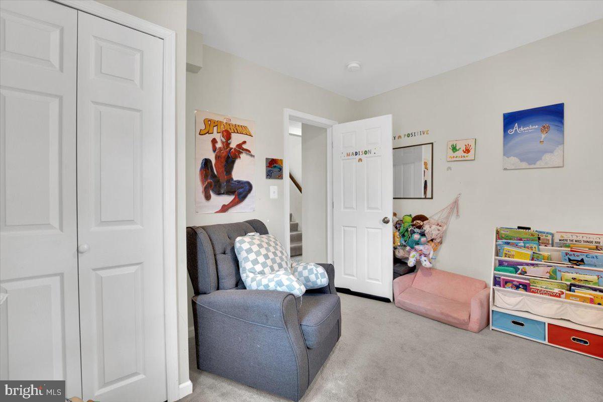 6519 Woodland Road Suitland, MD 20746 - Photo 17 of 35 a living room with furniture and a couch