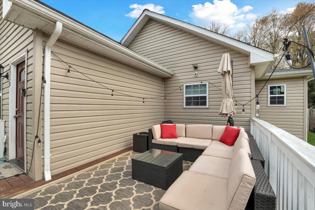 6519 Woodland Road Suitland, MD 20746 - Photo 28 of 35 a view of a two chairs in the back