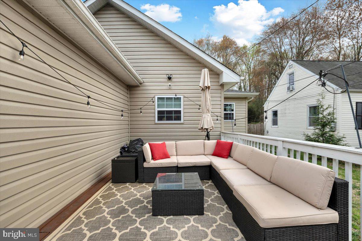 6519 Woodland Road Suitland, MD 20746 - Photo 29 of 35 a building outdoor space with patio furniture
