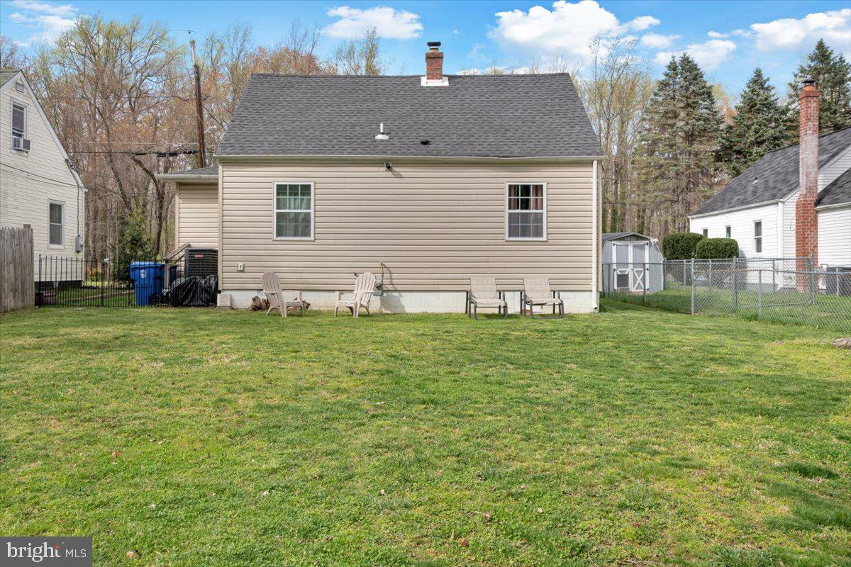 6519 Woodland Road Suitland, MD 20746 - Photo 32 of 35 a front view of house with yard and green space