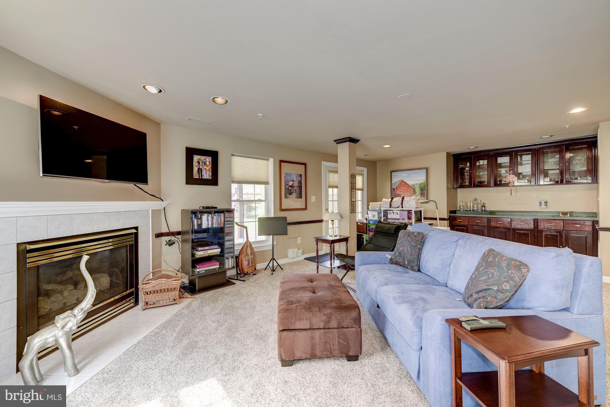 2125 Chippewa Place Silver Spring, MD 20906 - Photo 22 of 31 Family Room With Fireplace and Wet Bar