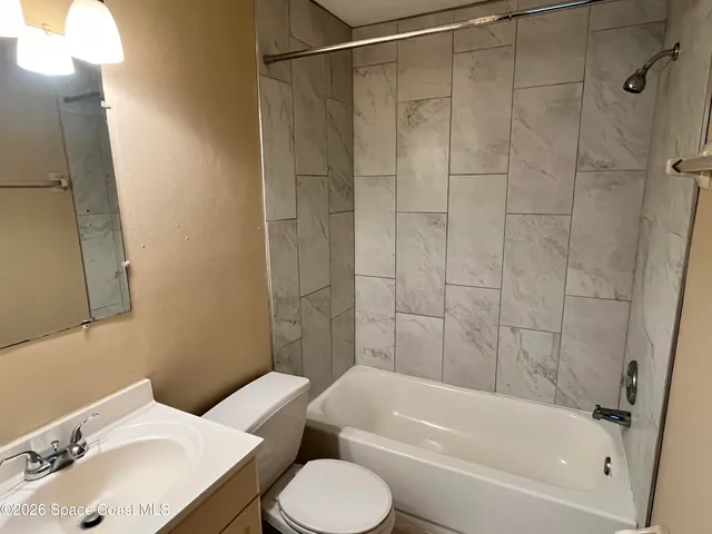 a bathroom with a sink and a bathtub