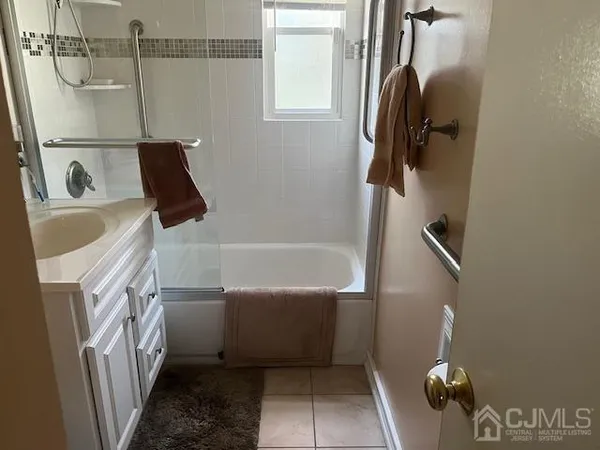 a bathroom with a sink and a tub
