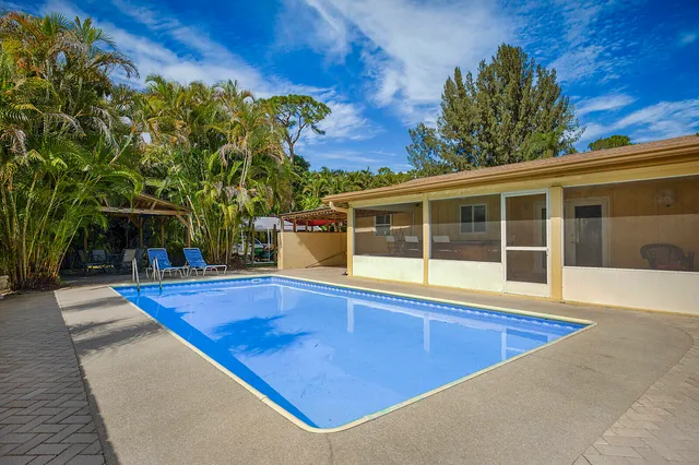 a view of outdoor space and swimming pool