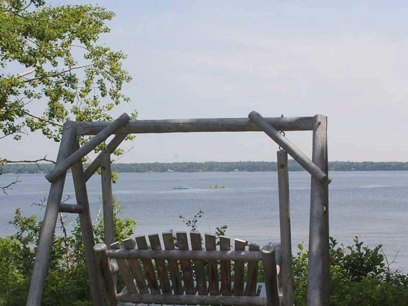 1406 Newbury Neck Road Surry, ME 04684 - Photo 18 of 18 View. Enjoy the view from the swing.