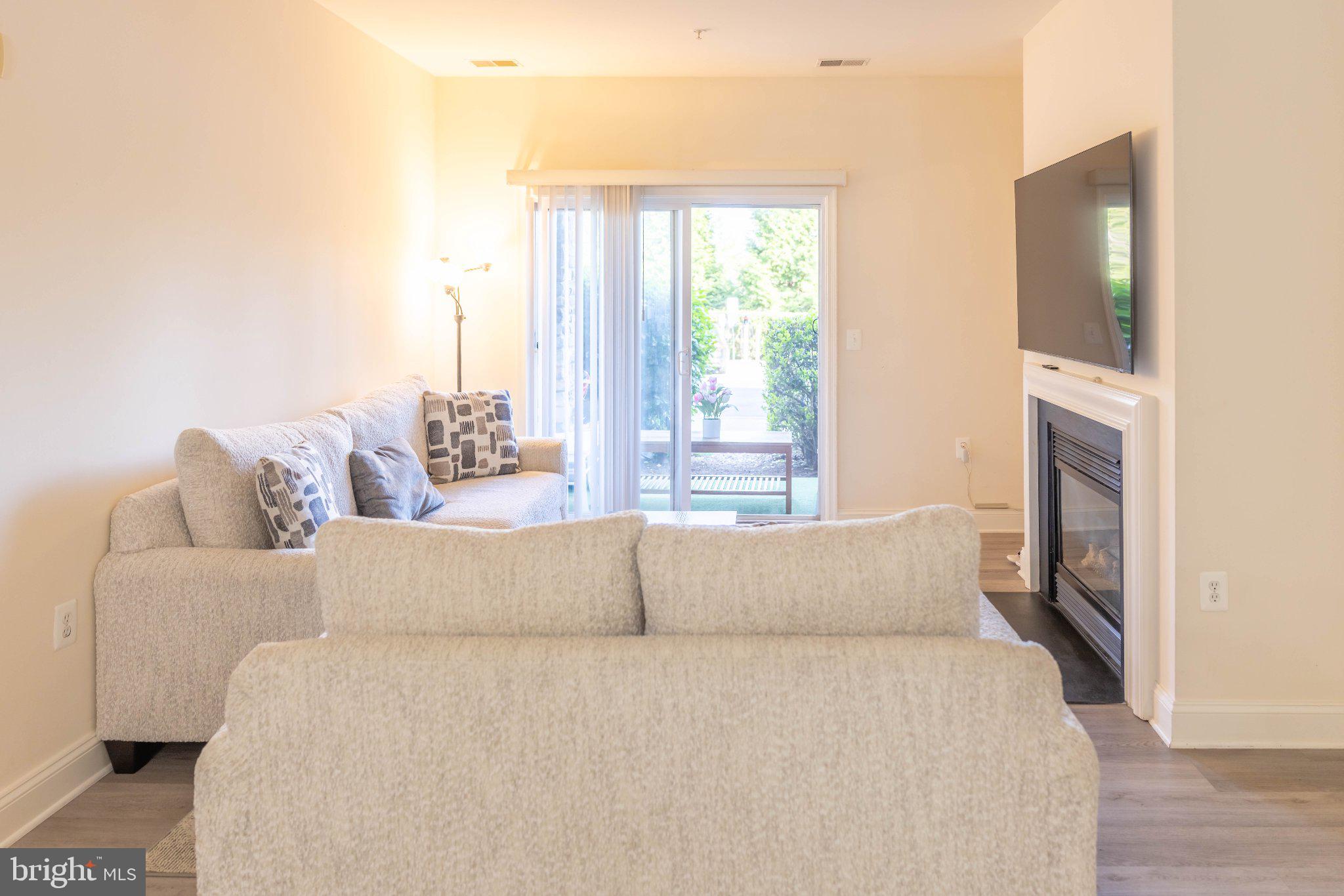 12824 Clarksburg Square Road, Unit 105 Clarksburg, MD 20871 - Photo 24 of 96 Bright and inviting living space.