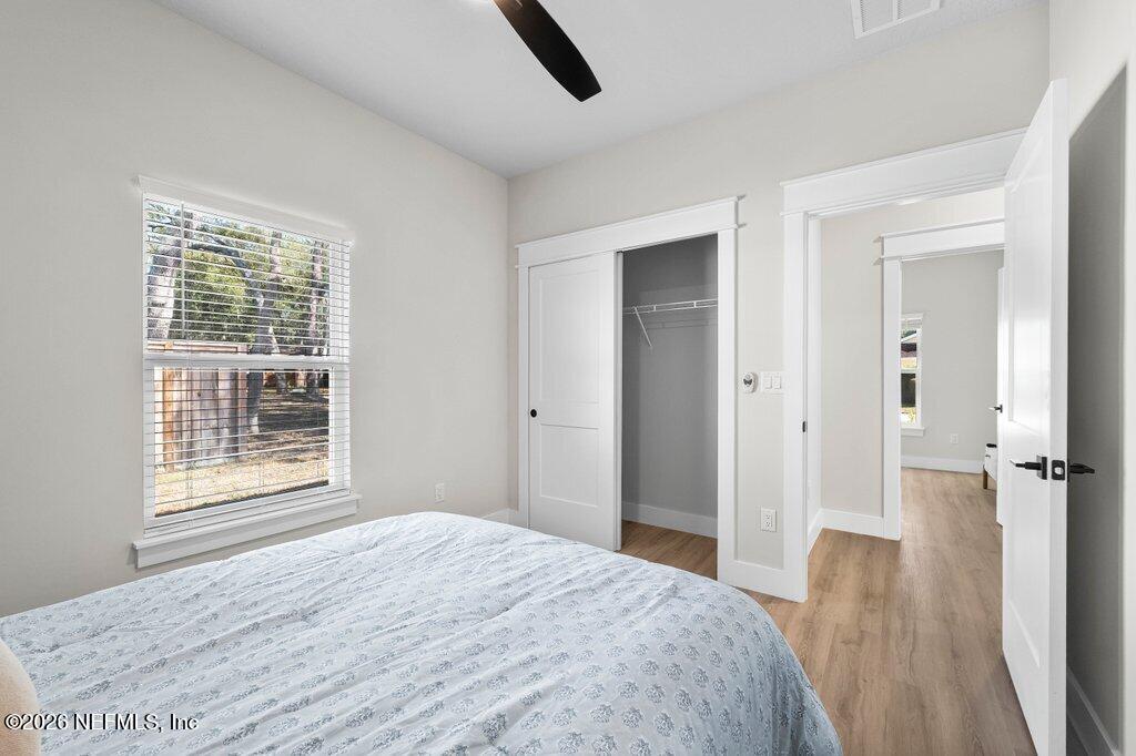 9019 Hipps Road Jacksonville, FL 32222 - Photo 8 of 35 a bedroom with a bed and a window