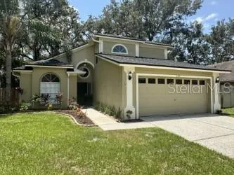 a front view of house with yard