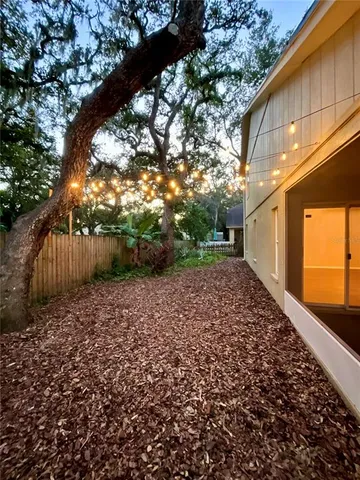 a view of backyard with green space