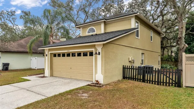 a front view of a house with a garage