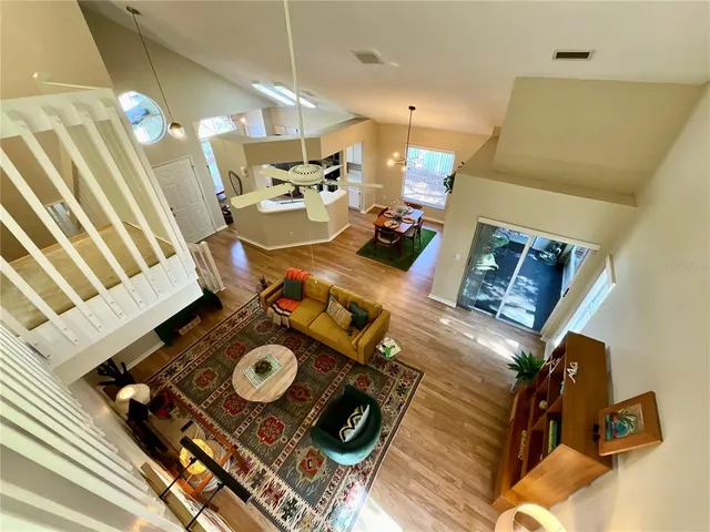 a view of living room with furniture and a rug