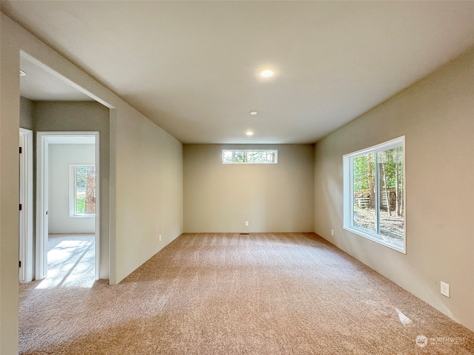 180 Madrona Way Sequim, WA 98382 - Photo 13 of 35 an empty room with windows