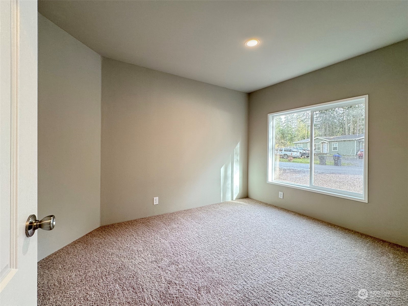 180 Madrona Way Sequim, WA 98382 - Photo 18 of 35 a view of an empty room with a window