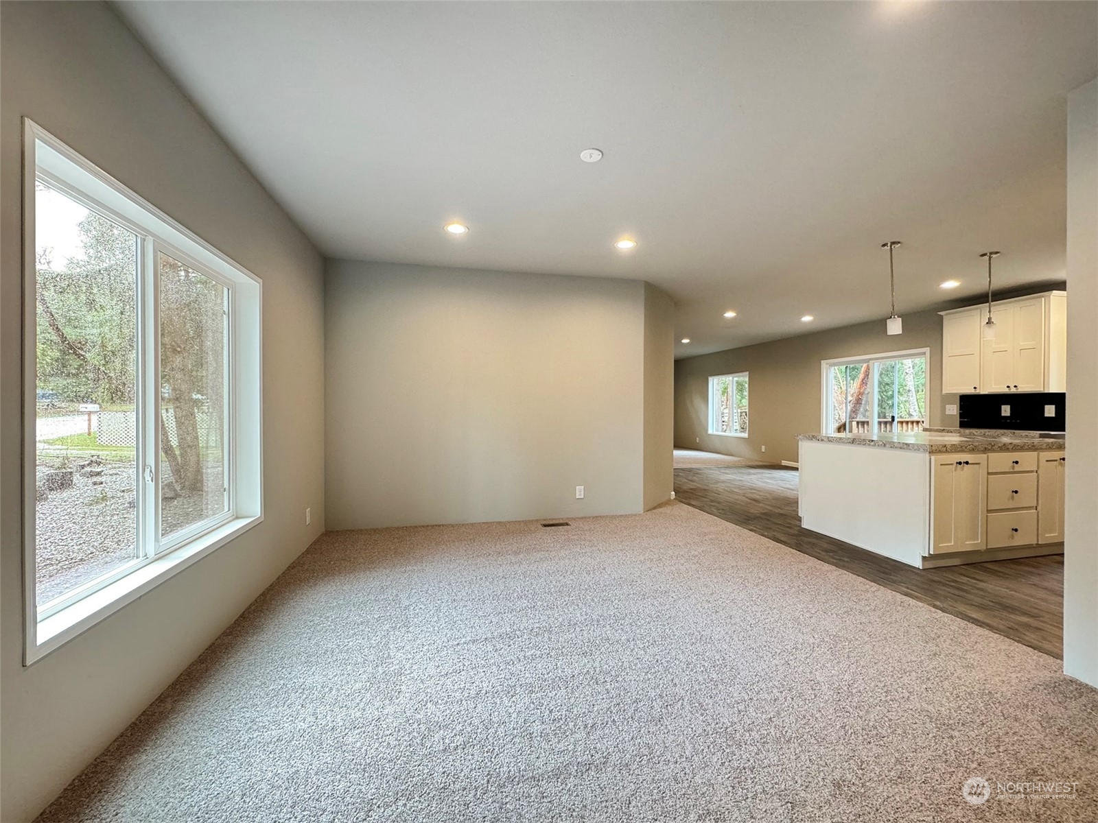 180 Madrona Way Sequim, WA 98382 - Photo 2 of 35 a view of an empty room with a window