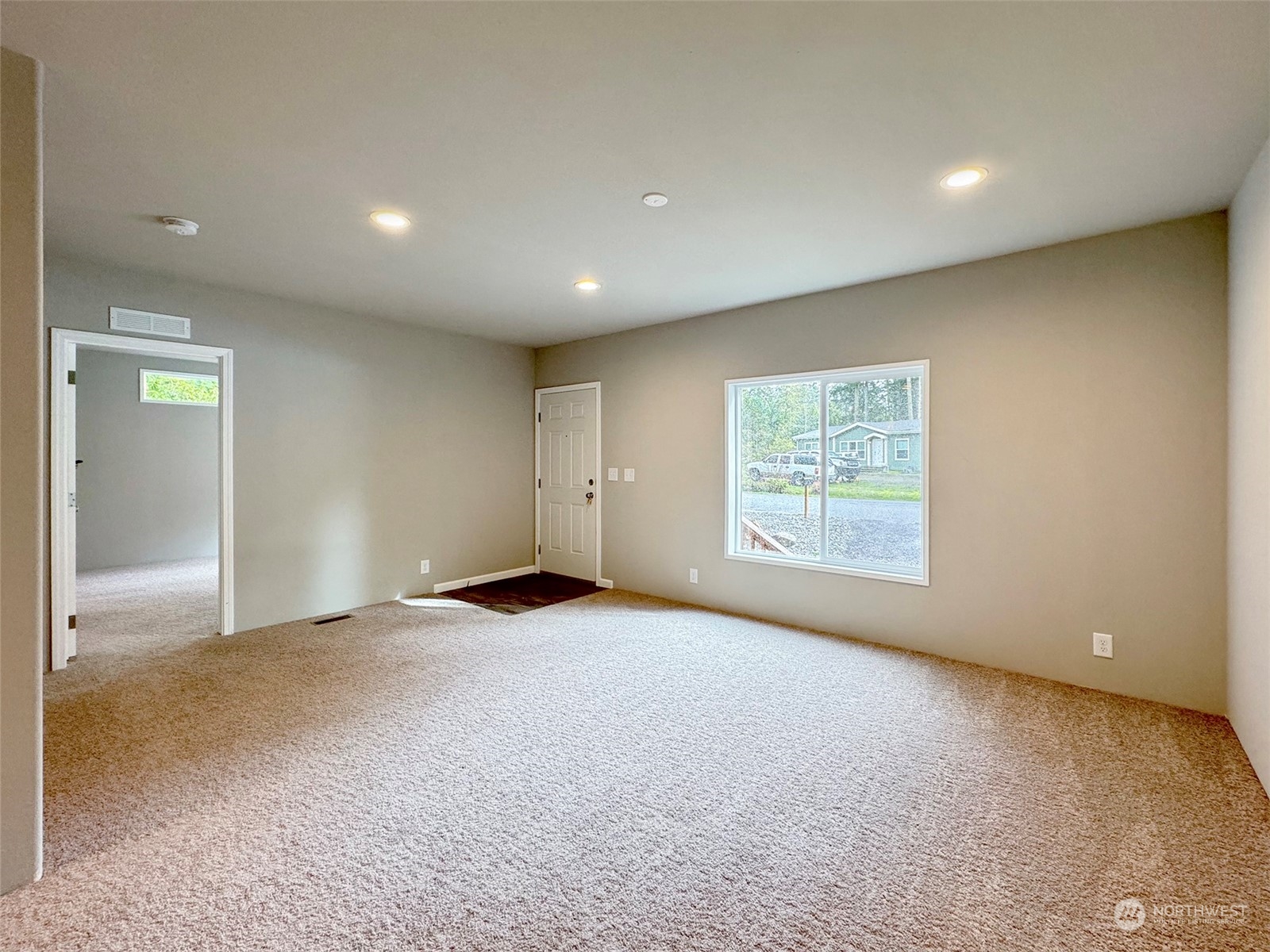 180 Madrona Way Sequim, WA 98382 - Photo 21 of 35 a view of an empty room with a window