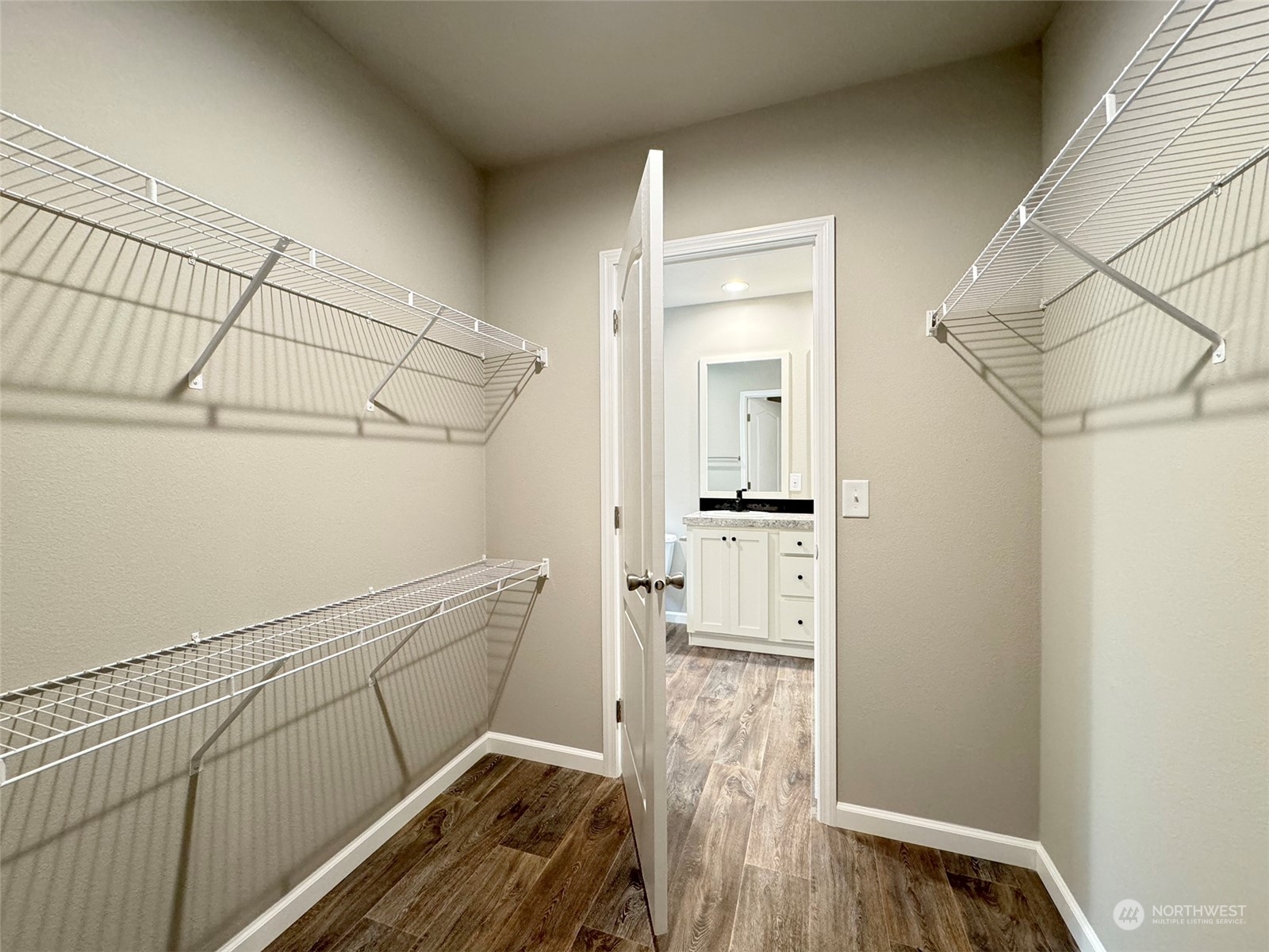 180 Madrona Way Sequim, WA 98382 - Photo 30 of 35 a view of walk in closet with empty racks