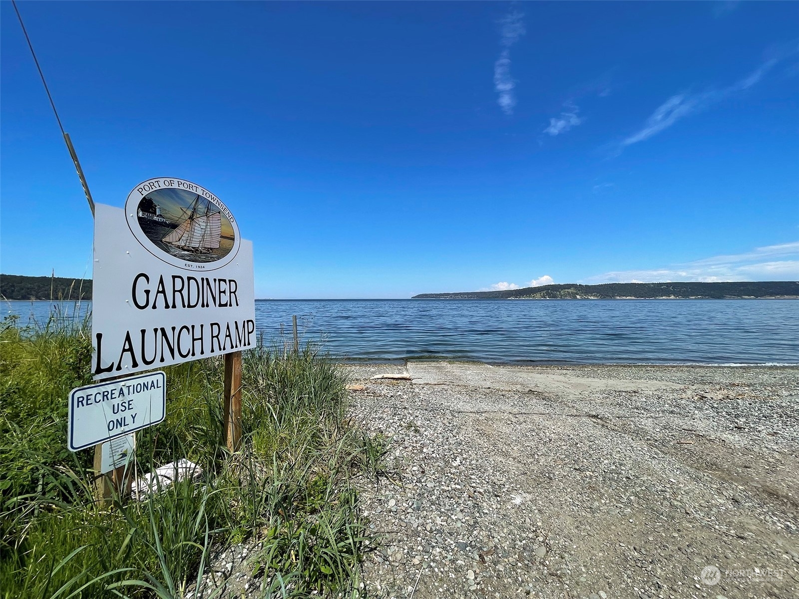 180 Madrona Way Sequim, WA 98382 - Photo 35 of 35 a view of a sign under a city
